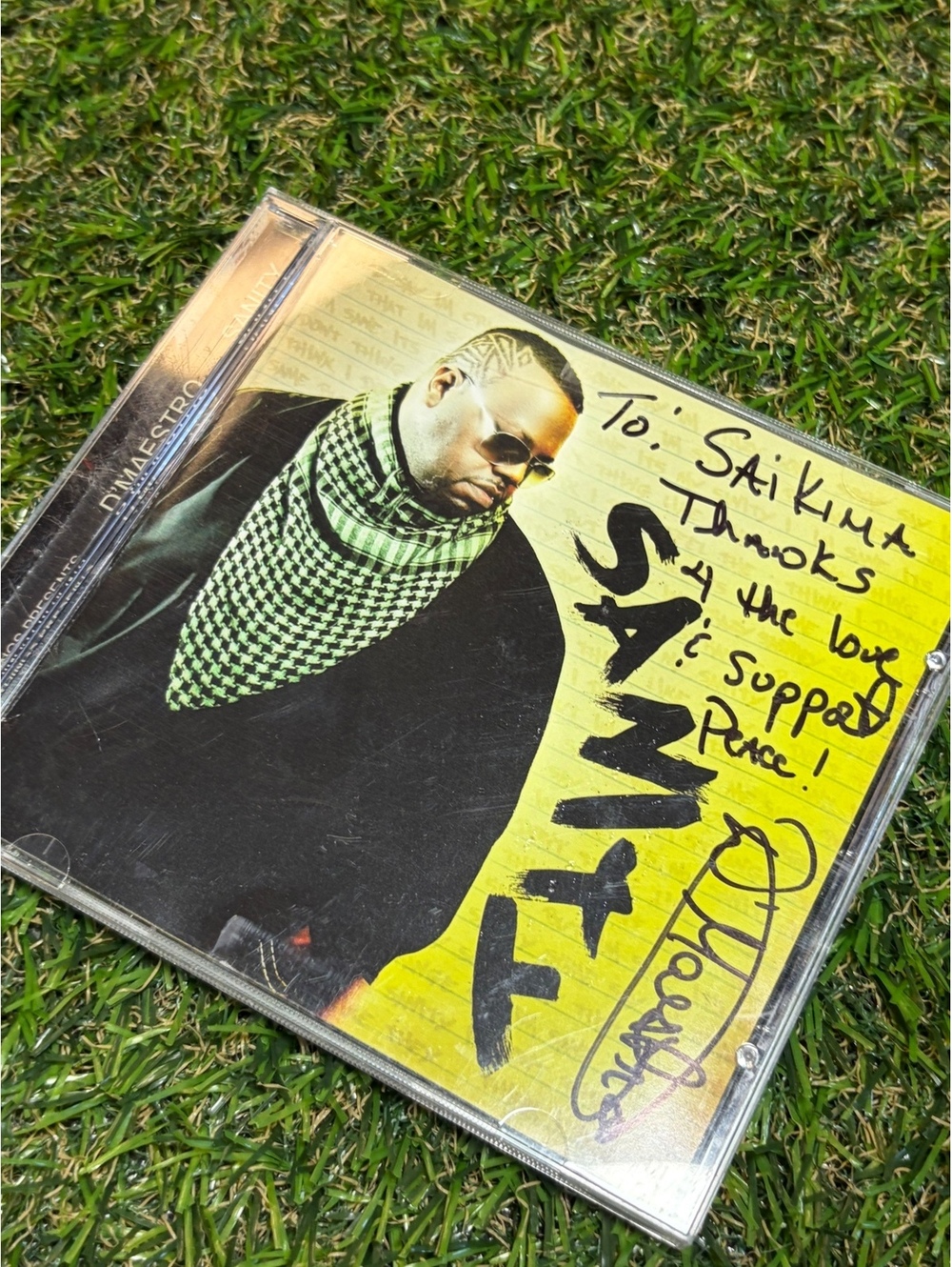 Signed Sanity CD by D-Maestro